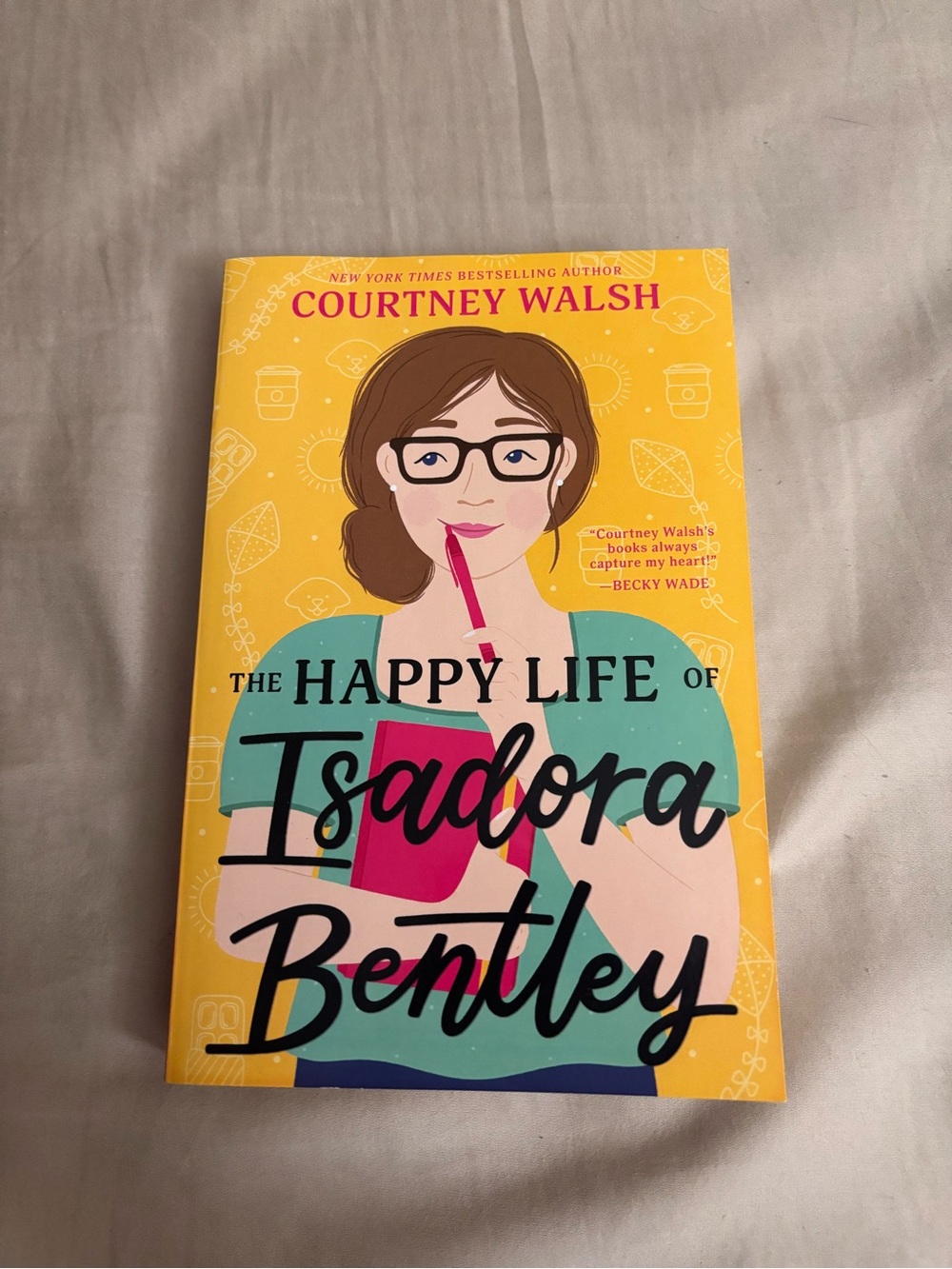 The Happy Life of Isadora Bentley by Courtney Walsh - Yellow Cover
